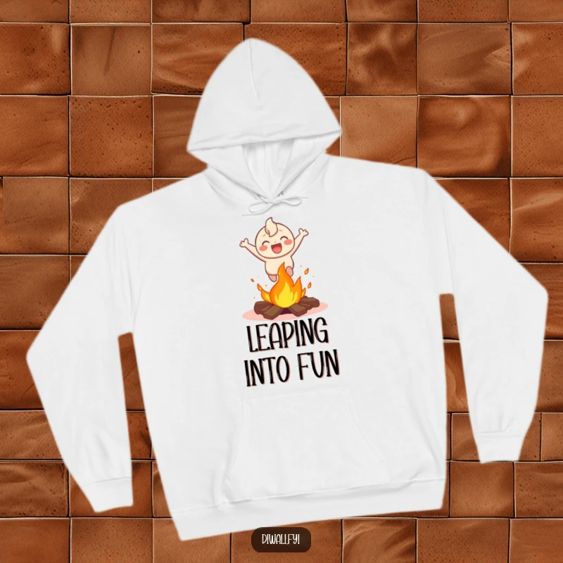 Funny hoodie showing a happy character joyfully leaping over a small bonfire, perfect for staying warm while celebrating daring and excitement.